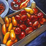 Colourful harvest of red, orange and yellow heritage tomatoes in a wooden crate and two white ceramic bowls on a purple background