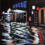 George Street, Peterborough on rainy night out. ShowPlace and a night club spills the blue lights out on the wet street.